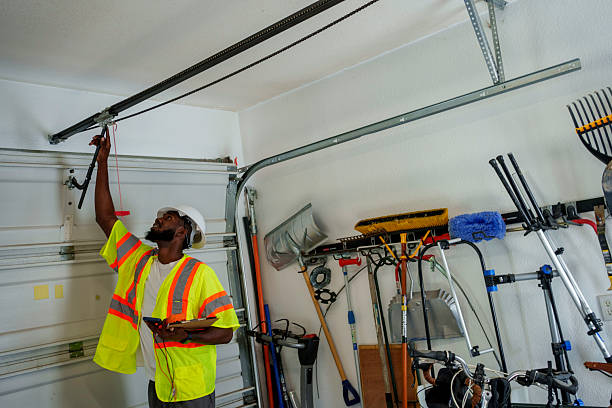 Professional Garage Door Panel Replacement technician working in Jensen Beach, FL